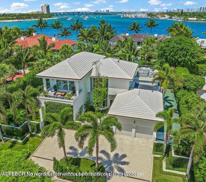 This stunning modern home was completely renovated in 2022 and is ideally located at the very north end of Palm Beach with nearby beach and intracoastal access.