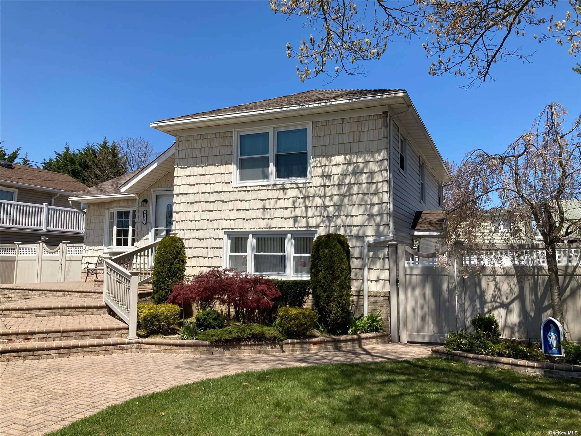 Mint and bright split level in the beautiful Village of Massapequa Park in the Massapequa School District, close to the preserve.