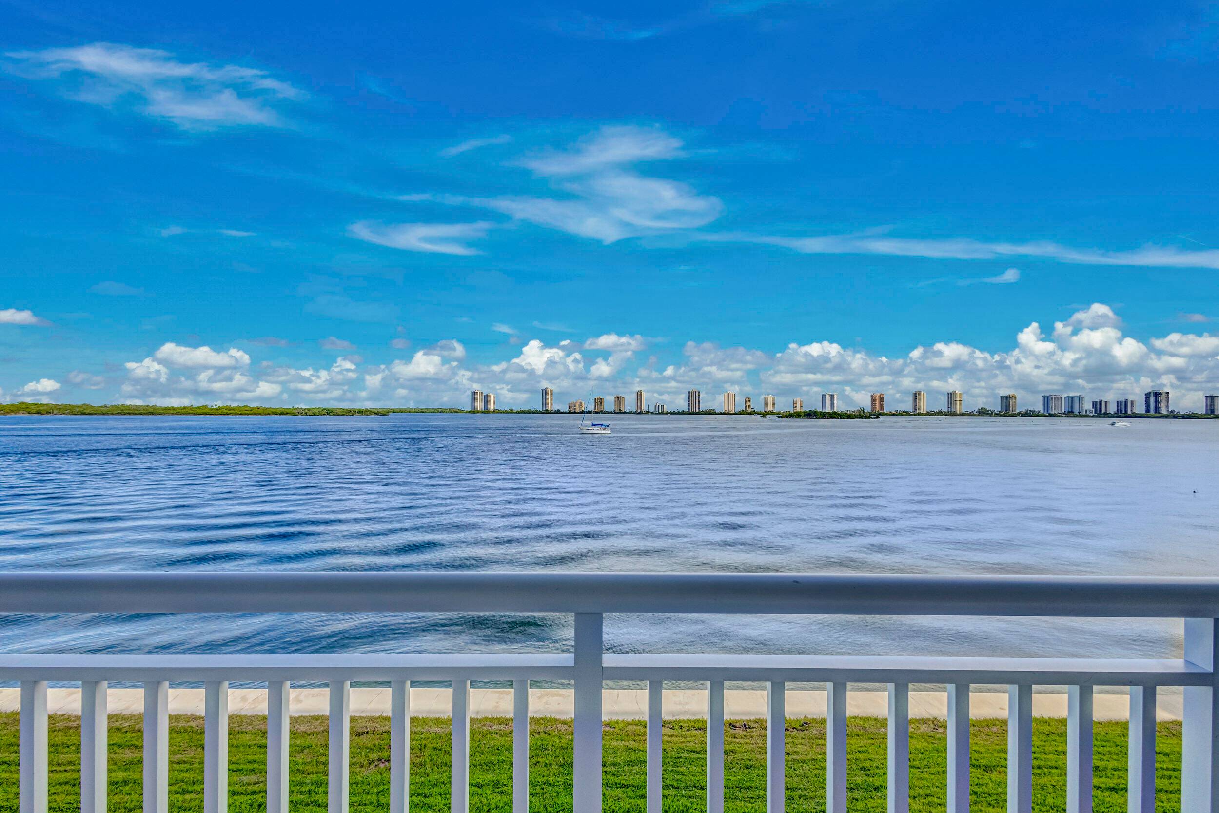 Unit screened porch looks directly at the intracoastal waterway.