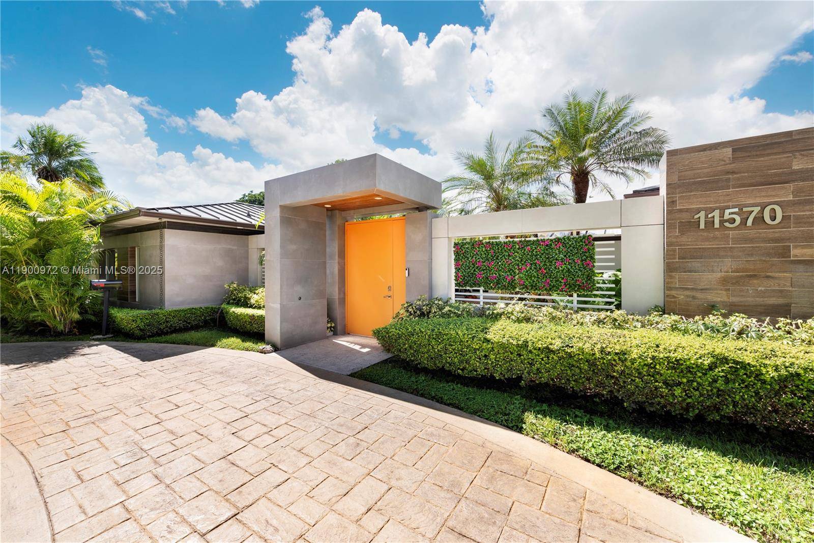 Hidden behind a lush private atrium, this 5BD 4.