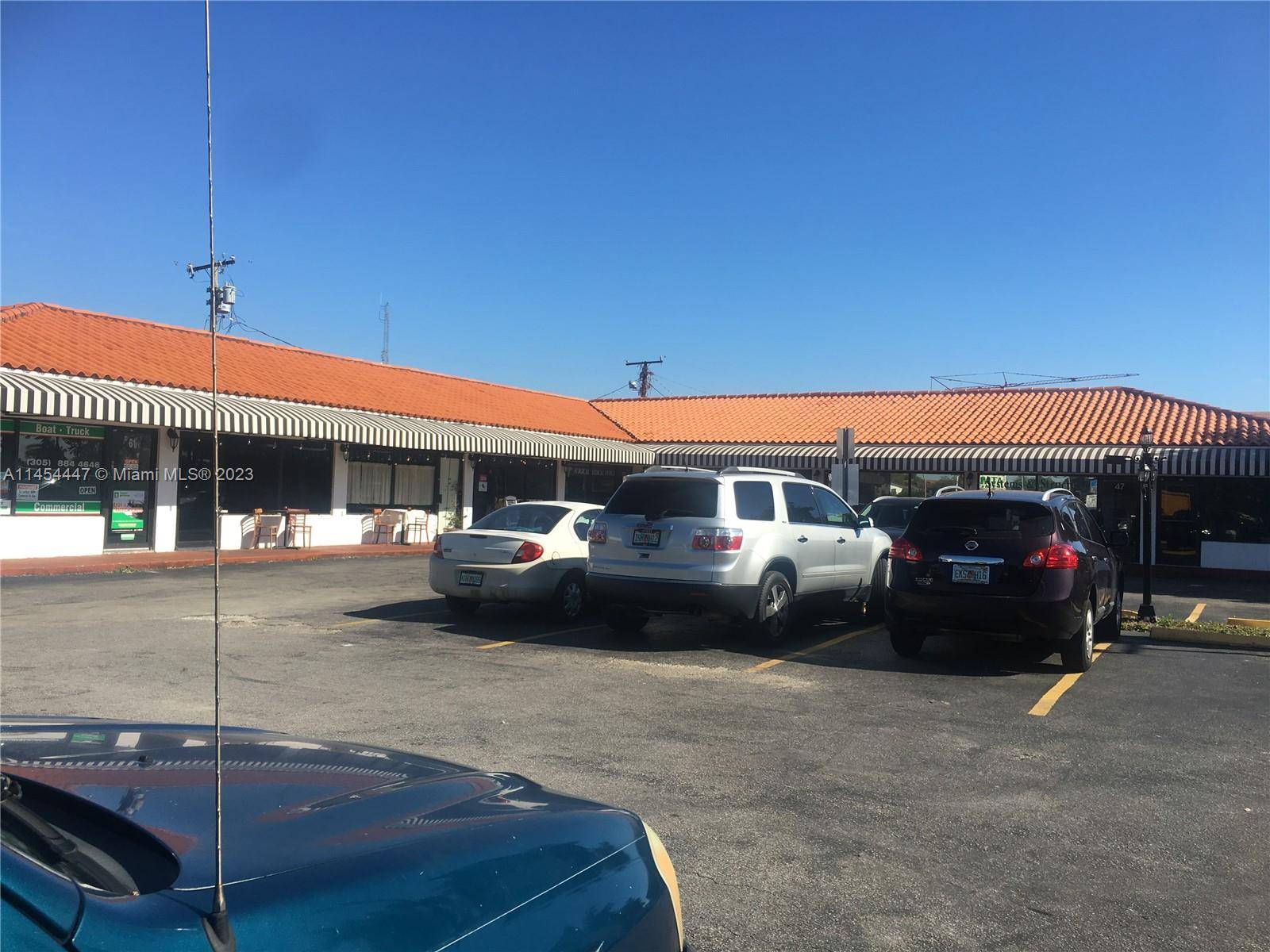 Great strip shopping center located on a large corner lot.