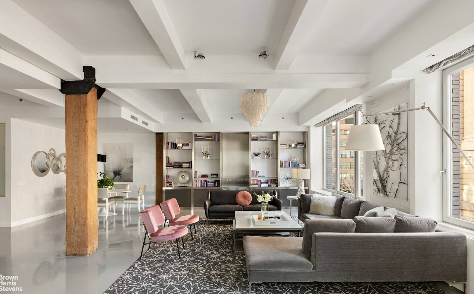 This pristine 3, 250SF condominium loft is located right at the crossroads of Soho and Hudson Square and offers clean modern lines, a spacious 3 bedroom, 3.