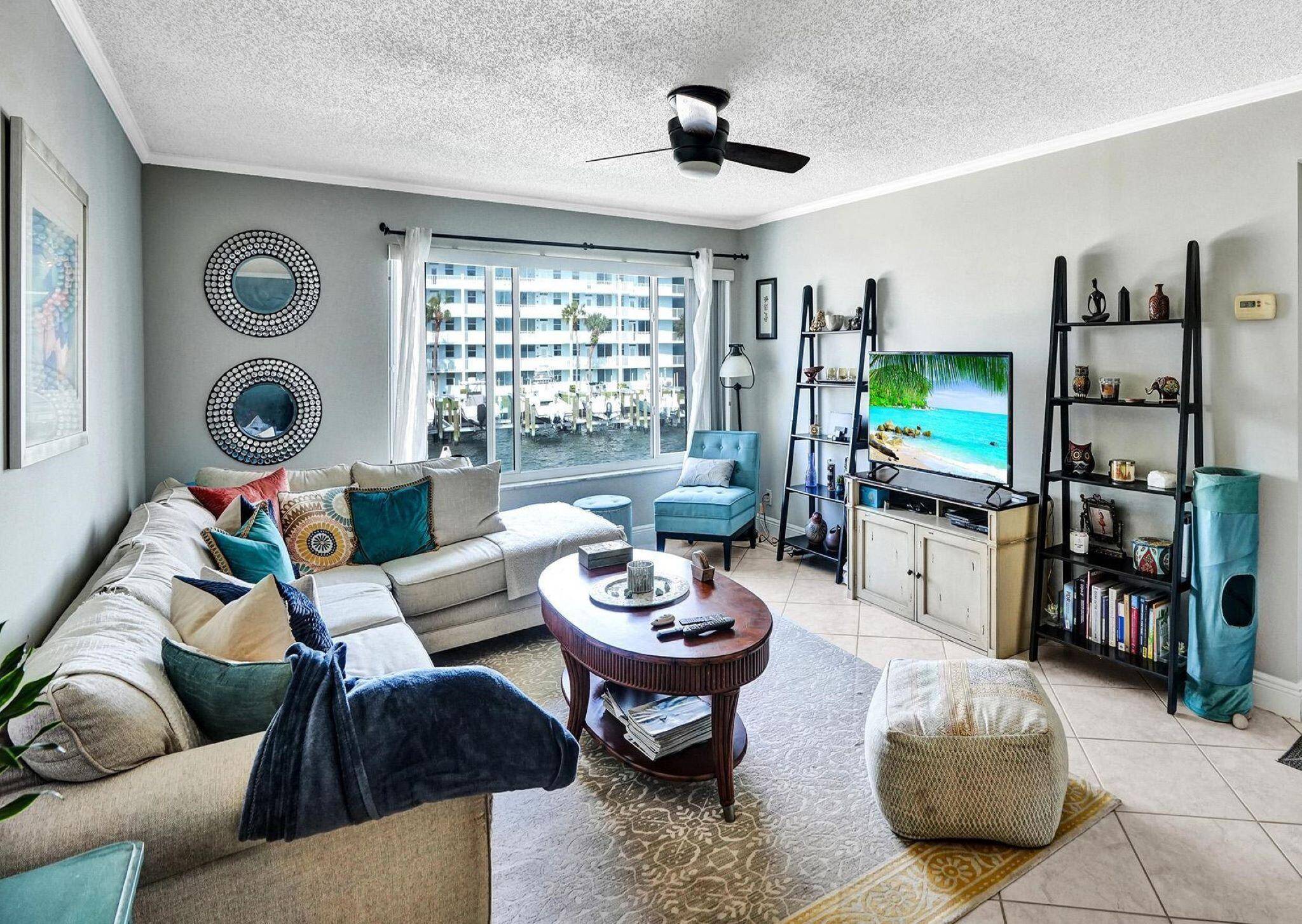 Relax and watch the boats go by from your sought after 2 bedroom end unit.
