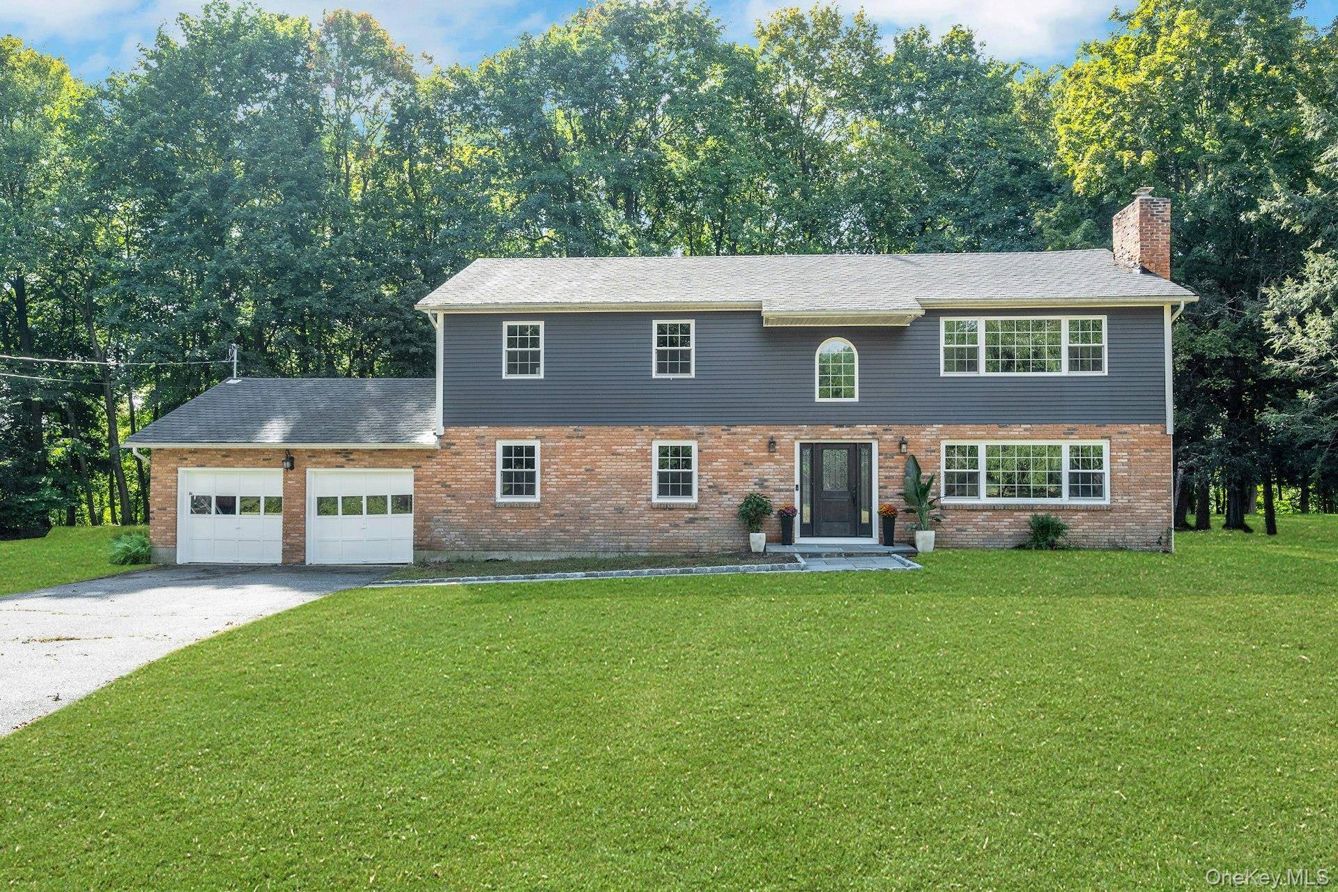 Tucked away on a quiet cul de sac in the picturesque town of Katonah, this beautifully updated five bedroom, four bath home sits on over an acre and offers more ...