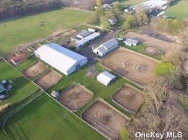 Barn for Lease, 12 Acres, 60 stalls, Indoor arena, Hot walker, 2 outdoor arenas, Round pen, Trail arena, Office, 2 living trailers for grooms, All equipment, phone, and internet included.