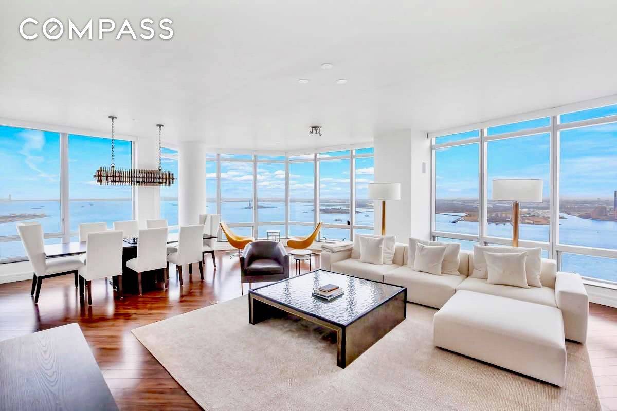 Perched on a high floor of The Ritz Carlton Residences, this ultra luxurious 4 bedroom, 4.