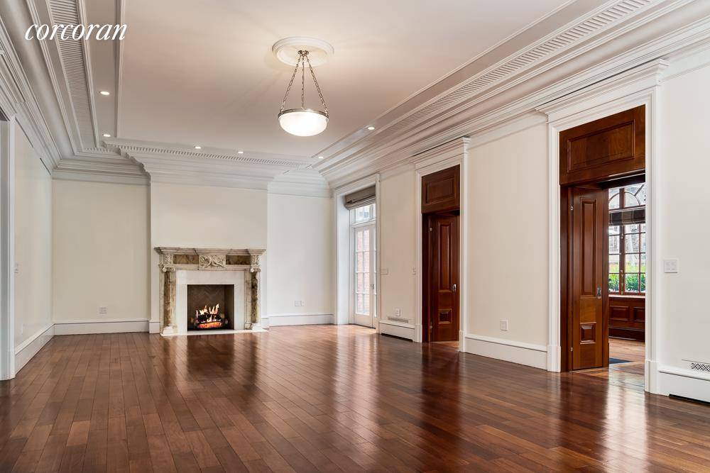 Perfectly situated just off Fifth Avenue on one of New York City's finest tree lined streets, this glamorous sun flooded home is located in a historic 40 foot limestone mansion.