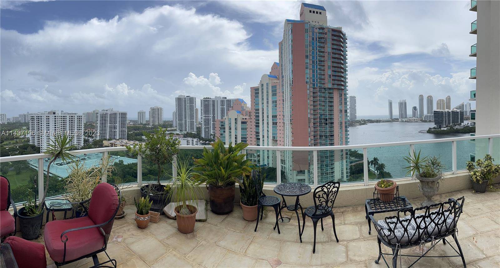 Breathtaking panoramic views of the ocean, Intracoastal Sunny Isles skyline from this TWO STORY PENTHOUSE in the secluded enclave community in Aventura with a marina and biking walking path.