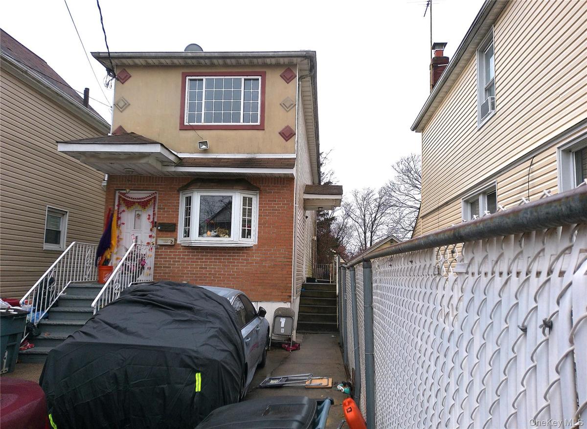 View of home's exterior featuring brick siding