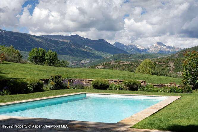 This exceptional private mountain top estate has gorgeous views of the Snowmass Mountain range.