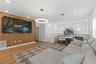 Oversized upstairs loft with custom tv wall