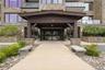 Beautifully maintained building exterior showcasing the properties exceptional curb appeal and welcoming presence.