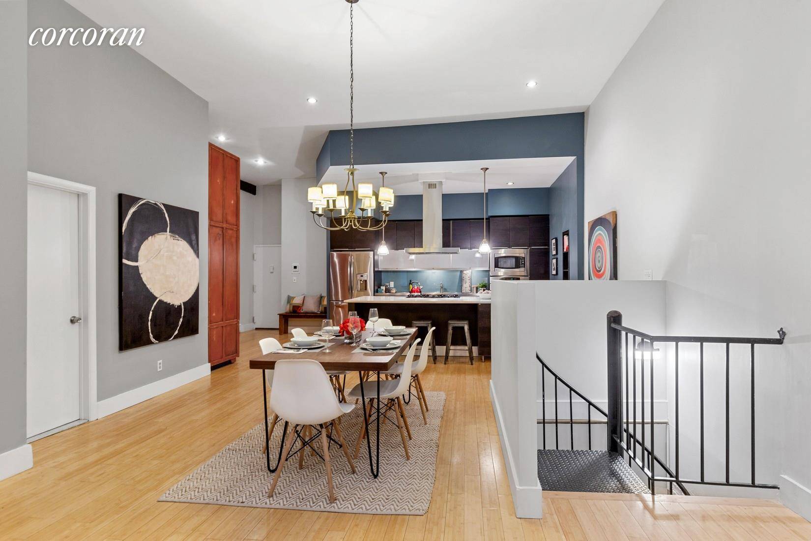 This sprawling and dramatic 2000 square foot duplex CONDO loft features three bedrooms, two baths, soaring 12' ceilings, a WORKING WOODBURNING FIREPLACE and a layout that will knock your socks ...