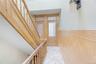 Hall featuring wainscoting