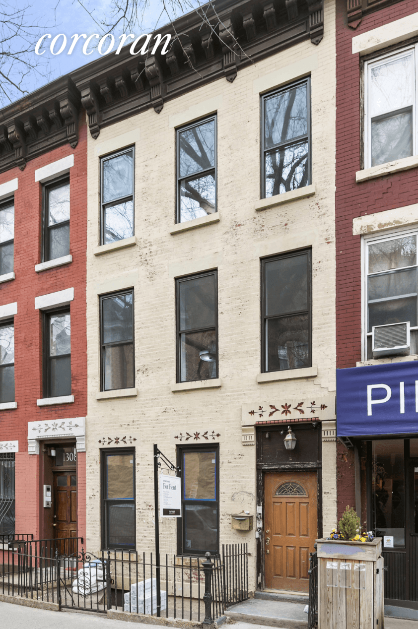 1306 8th Avenue is a Three Family Building located among a row of classic Park Slope brick townhouses.