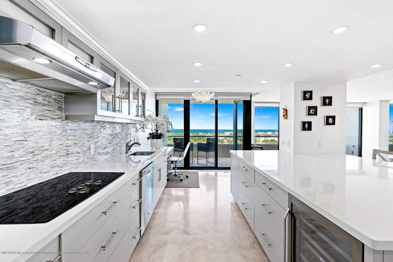Impressive 4, 000 SF residence and spectacular views of the Intracoastal, Ocean, and Palm Beach.