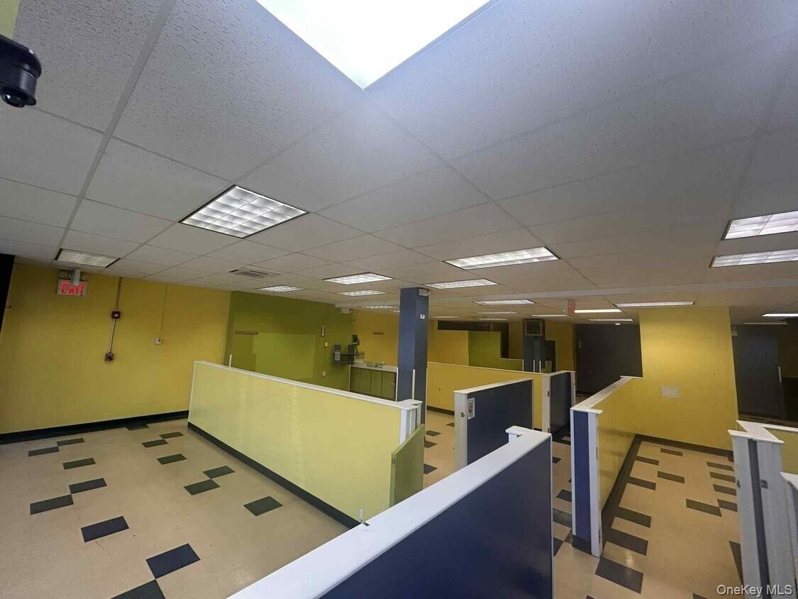 Reception area featuring a drop ceiling
