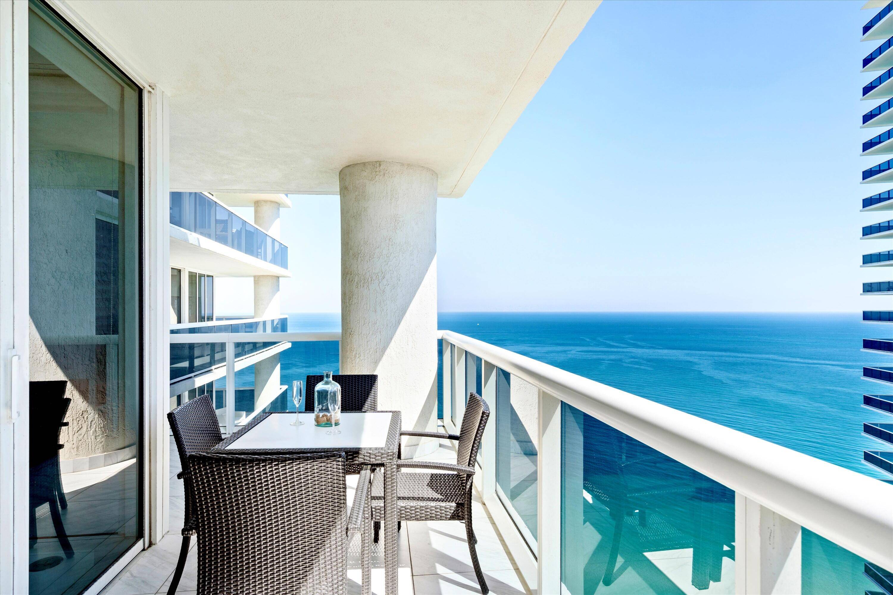 Welcome to Lower Penthouse 5, a gorgeous and updated corner unit where you are greeted with exceptional views of the ocean, city and intracoastal.