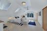 Private En-Suite Bedroom with Separate Entrance featuring lofted ceiling