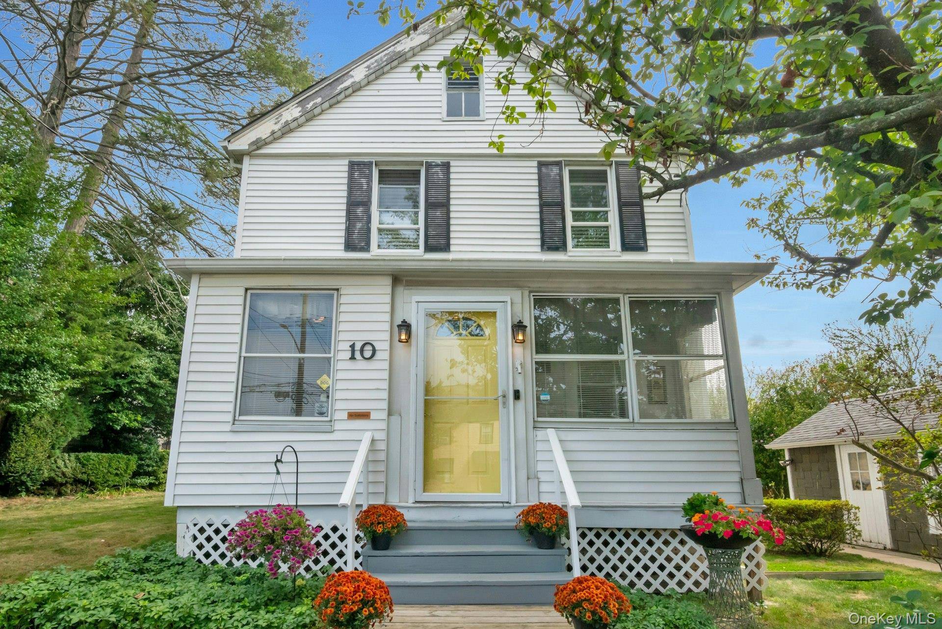 Welcome to 10 N Goodwin Avenue, a charming colonial in the heart of Elmsford offering 3 bedrooms, 1.