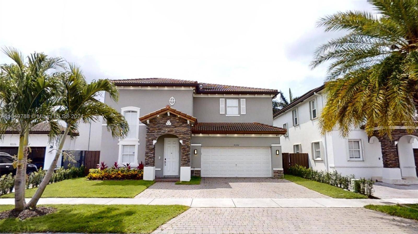 Stunning Two Story single family home in the most exclusive community, Menorca in Isle at Doral.