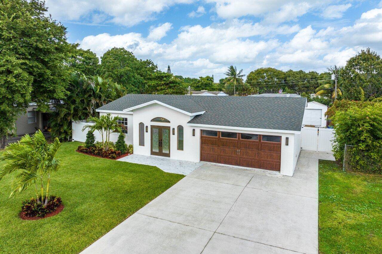 Enjoy the Delray lifestyle at 311 Gulfstream Drive in East Delray Beach within the no HOA neighborhood of Gulfstream Estates.
