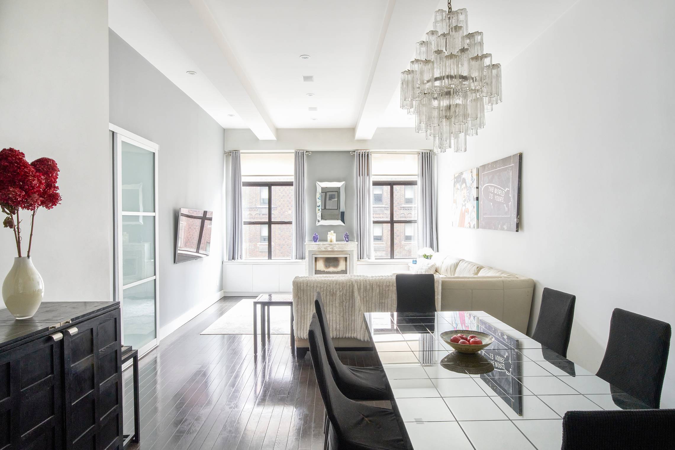 This 3 Bed 2 Bath Loft located in the heart of Midtown South features 11'2 ceilings, 7' Eastern facing windows that flood the home with natural light and an open ...