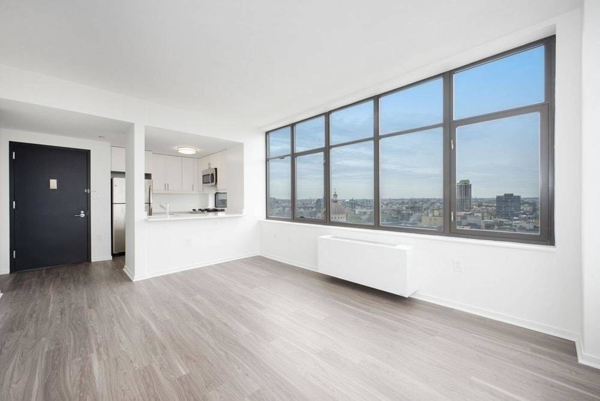 Renovated XL One Bedroom with Washer Dryer in Unit and Incredible South Facing Natural Light and Views.