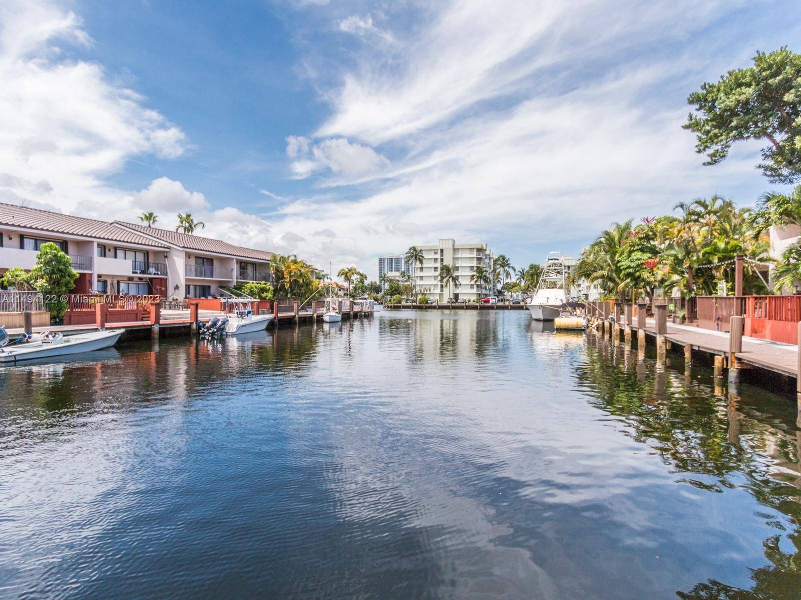 Waterfront Townhome located in Western Eastern Shores with dock space behind your townhome space for boat up to 18 feet.