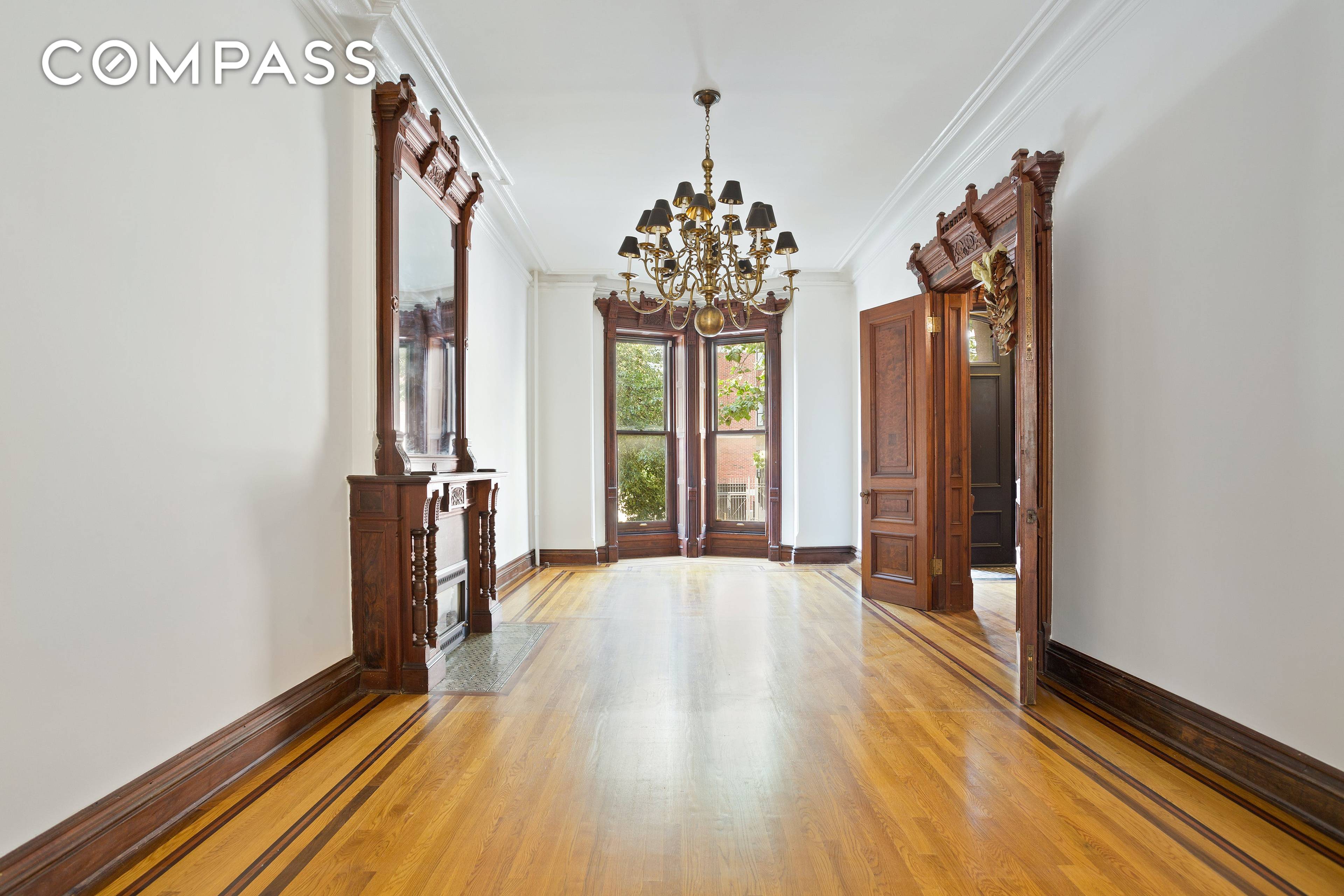 Park Slope triplex with private backyard and a parking space.