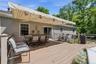 Spacious outdoor deck featuring composite decking and protective railing