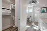Primary ensuite bath and walk in closet
