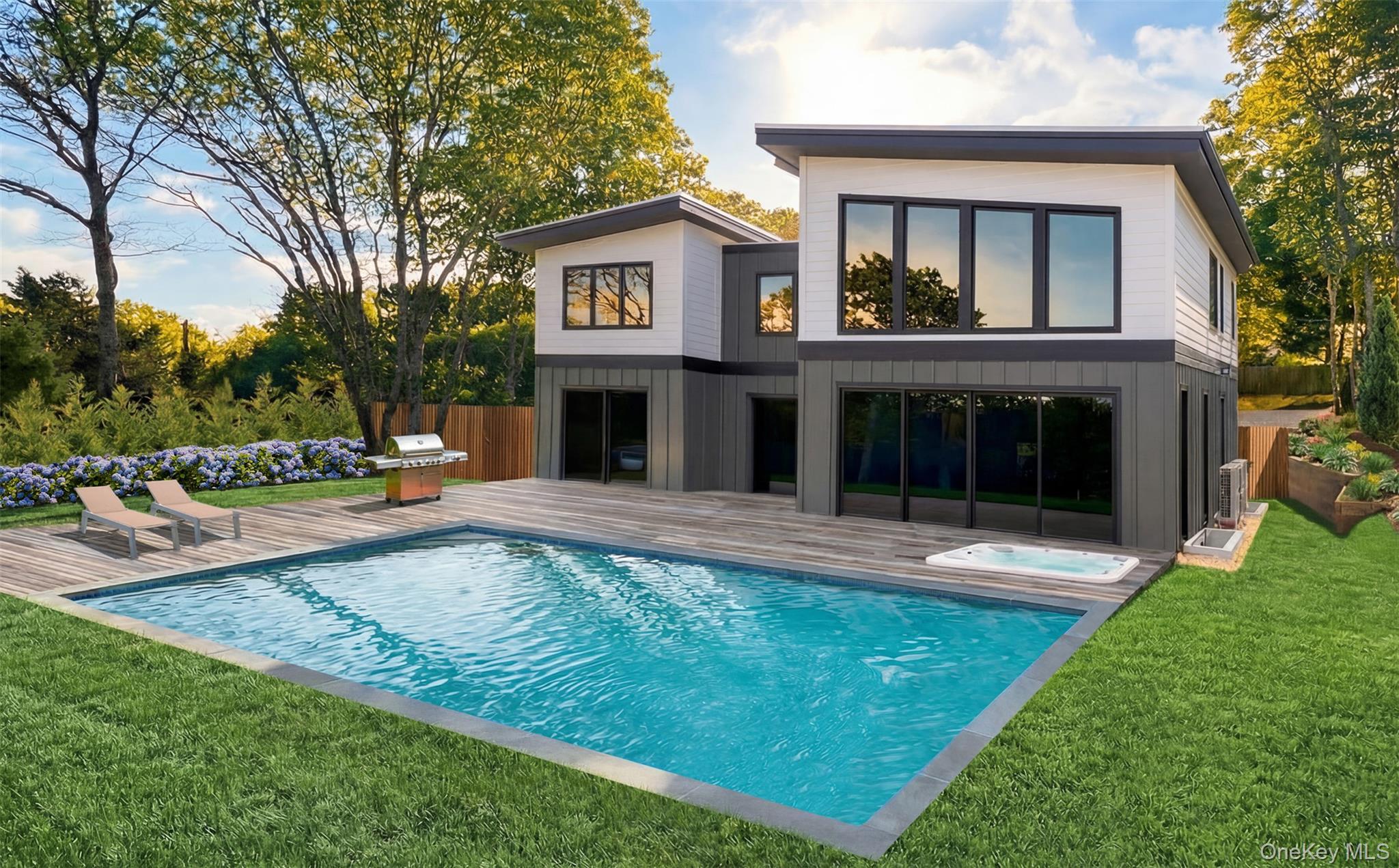 Modern exterior with horizontal siding, large windows & inground pool & spa