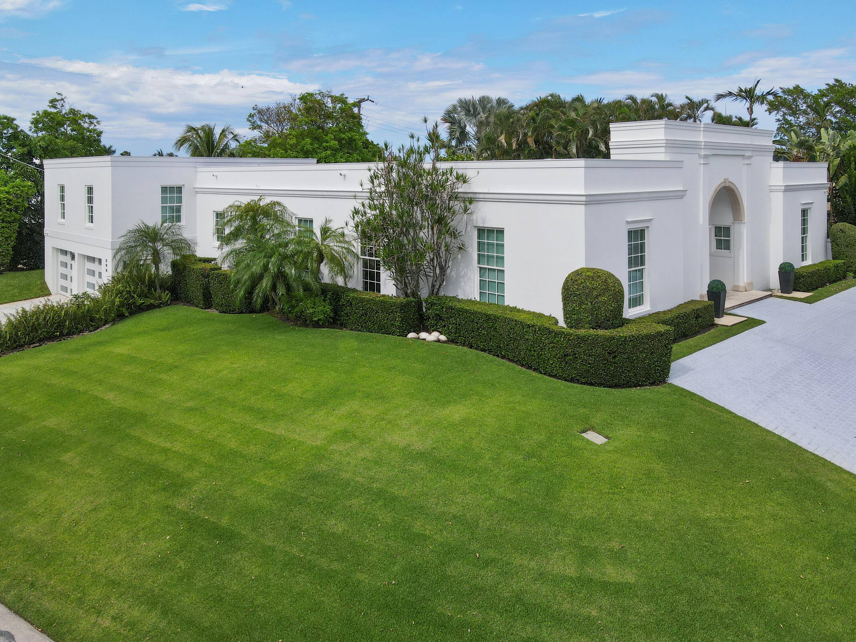 FIRST TIME on the market, this highly elevated contemporary regency house located on the sought after ''north end'' of Palm Beach Island with access to the lake trail and ocean ...