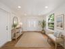 Virtually Staged down stairs foyer