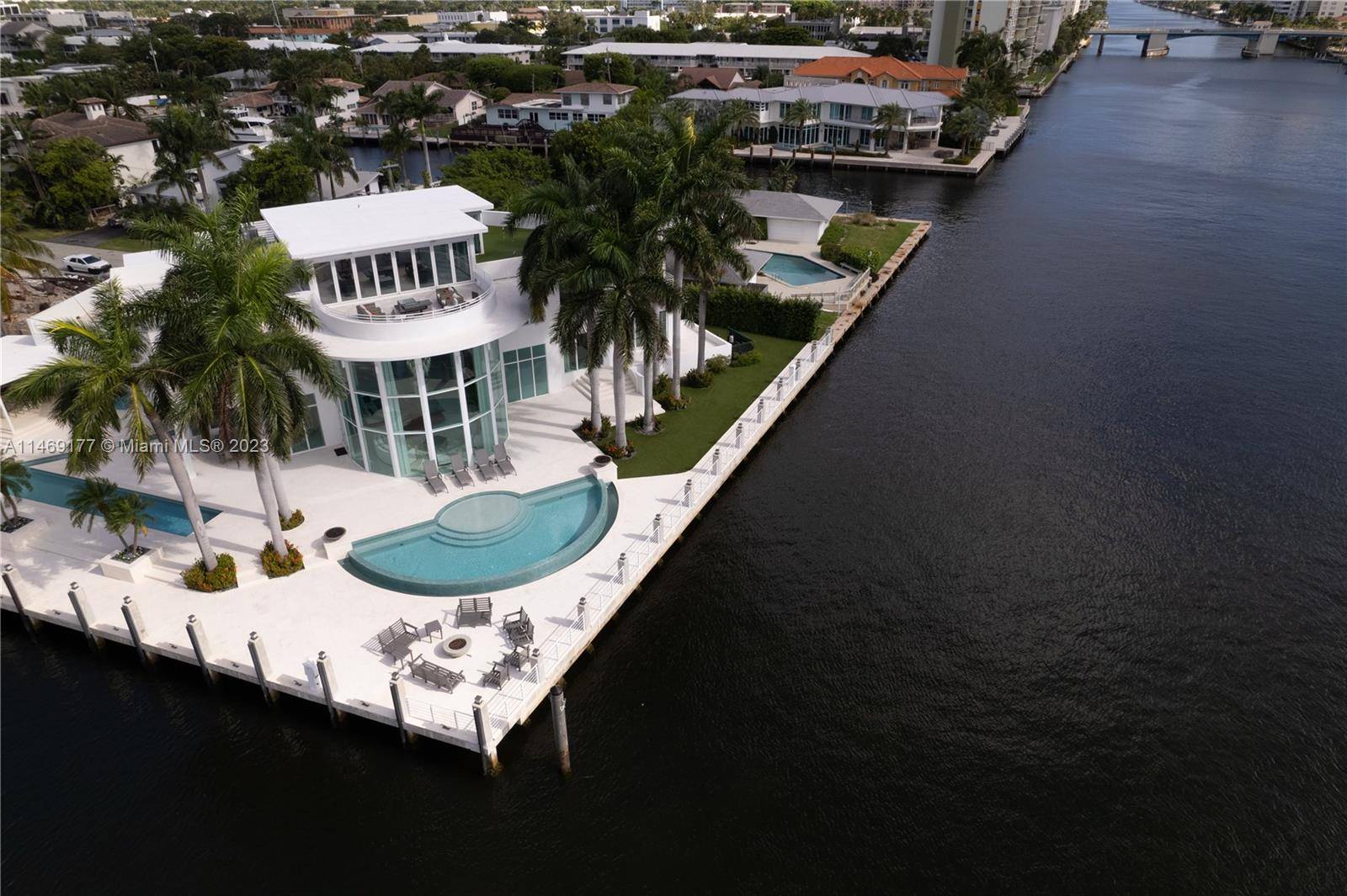 WATCH THE VIRTUAL TOUR. Modern masterpiece with bespoke details offers sprawling luxury living and boating !