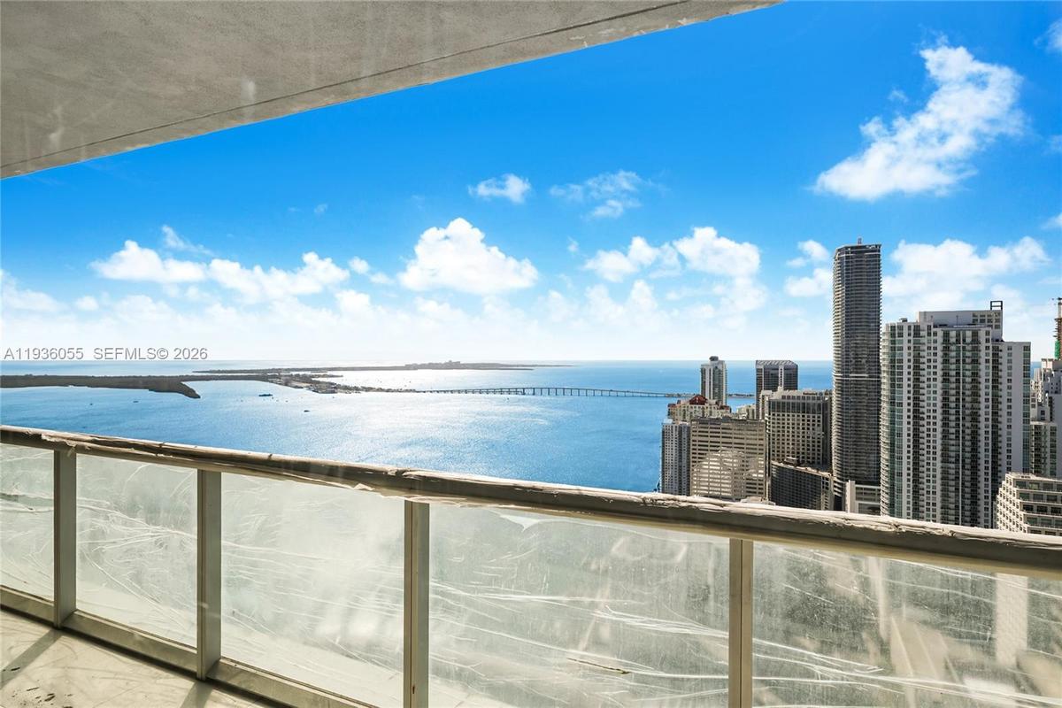 Glass railings have protective film due to construction work.
