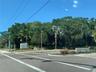 Bay Isles Grand Entrance from Gulf of Mexico Drive to Shopping, Golf Club and Bay Isles Community. Publix and CVS anchor a convenient shopping center