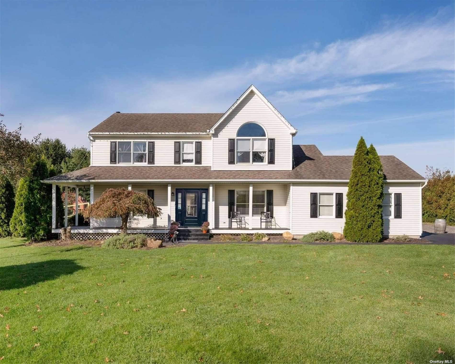 Welcome to this beautiful colonial style home that sits on 1.