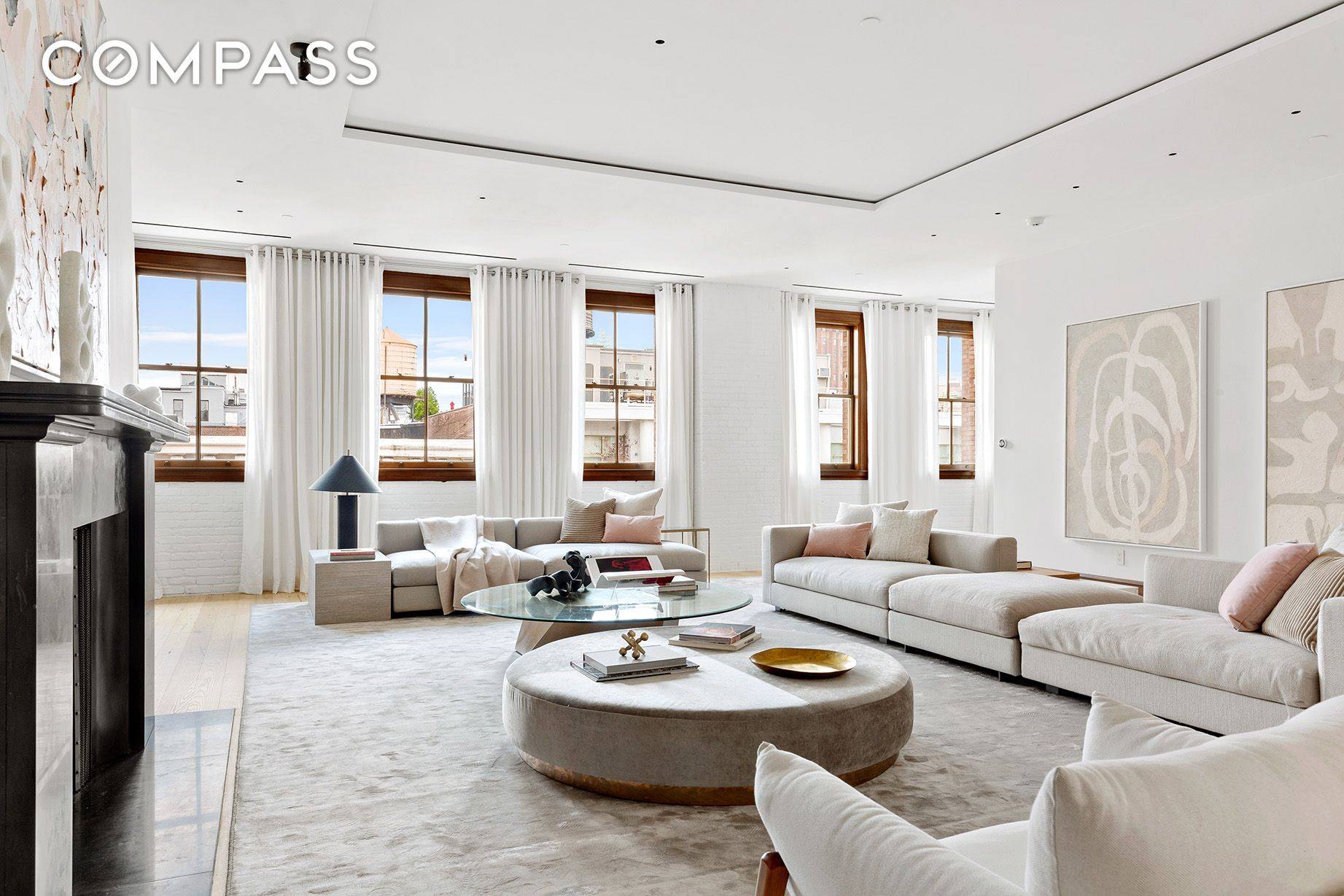 Newly renovated in 2022, this expansive and custom designed penthouse boasts a sprawling well proportioned layout, rooftop infinity pool and expansive private outdoor space atop the Roebling Building in Tribeca.