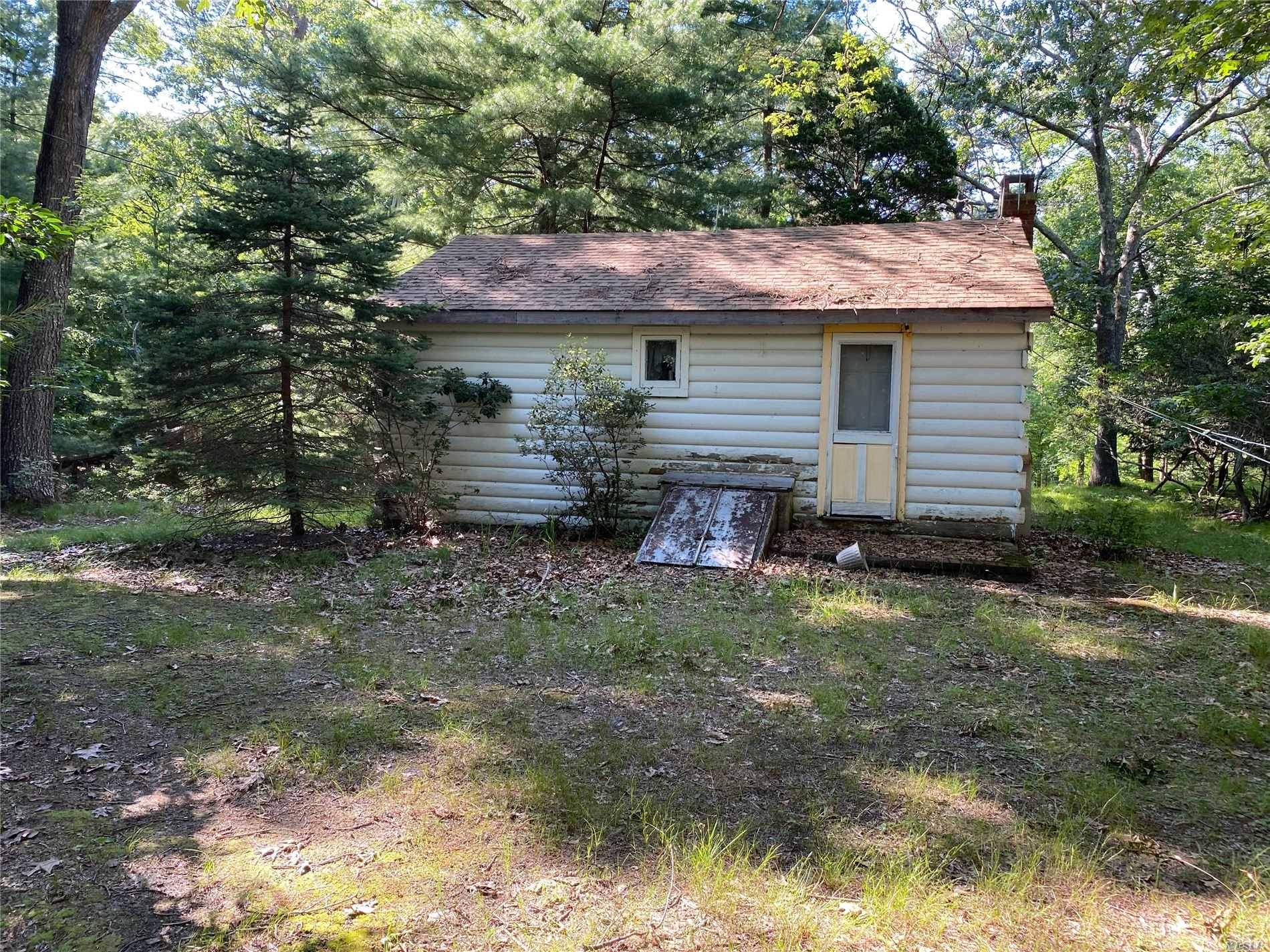 ATTENTION HOMEOWNERS OR BUILDERS LOOKING FOR SECLUSION SMALL CABIN ON PROPERTY, 3 LOTS TOTAL !