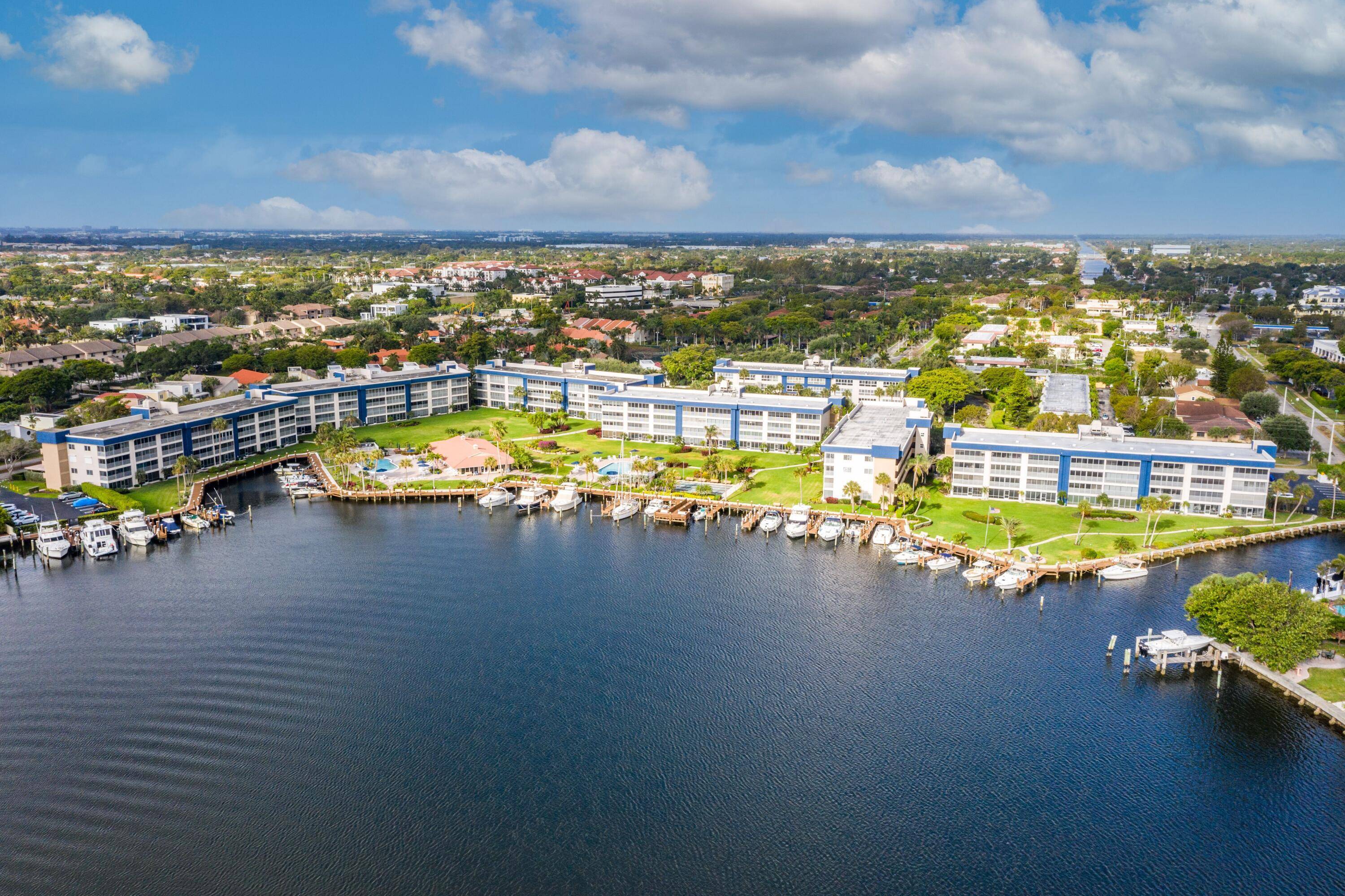 Rarely available 4th floor penthouse condominium offers both a private plus a water view of Tropic Harbor Bay with direct access to the intracoastal.