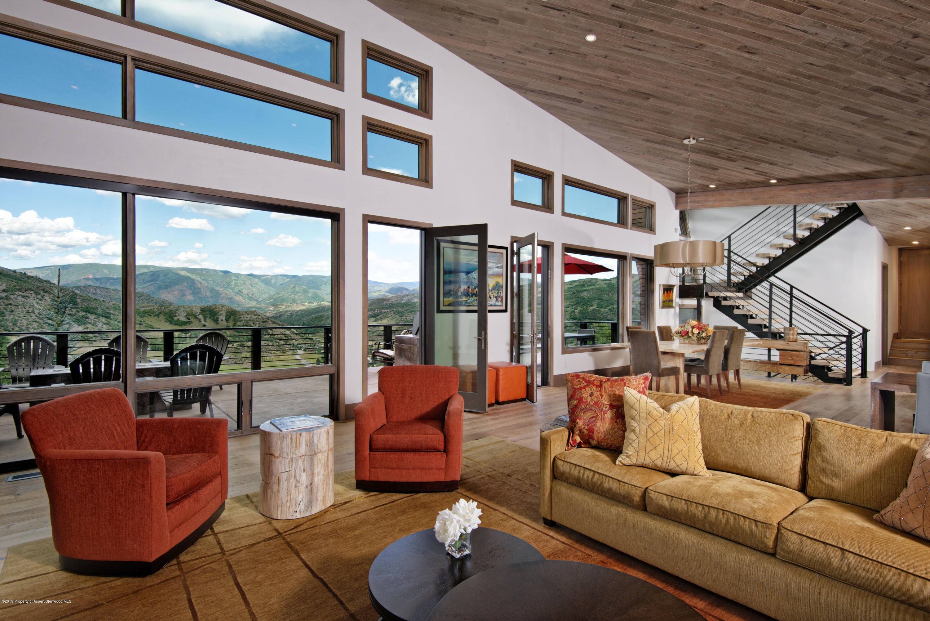 This stunning 5 bedroom mountain contemporary home on Oak Ridge Road features sweeping views framed by floor to ceiling windows, an open floor plan, gorgeous finishes and furnishings, two living ...
