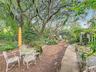 Backyard leading from efficiency apartment to In-law suite