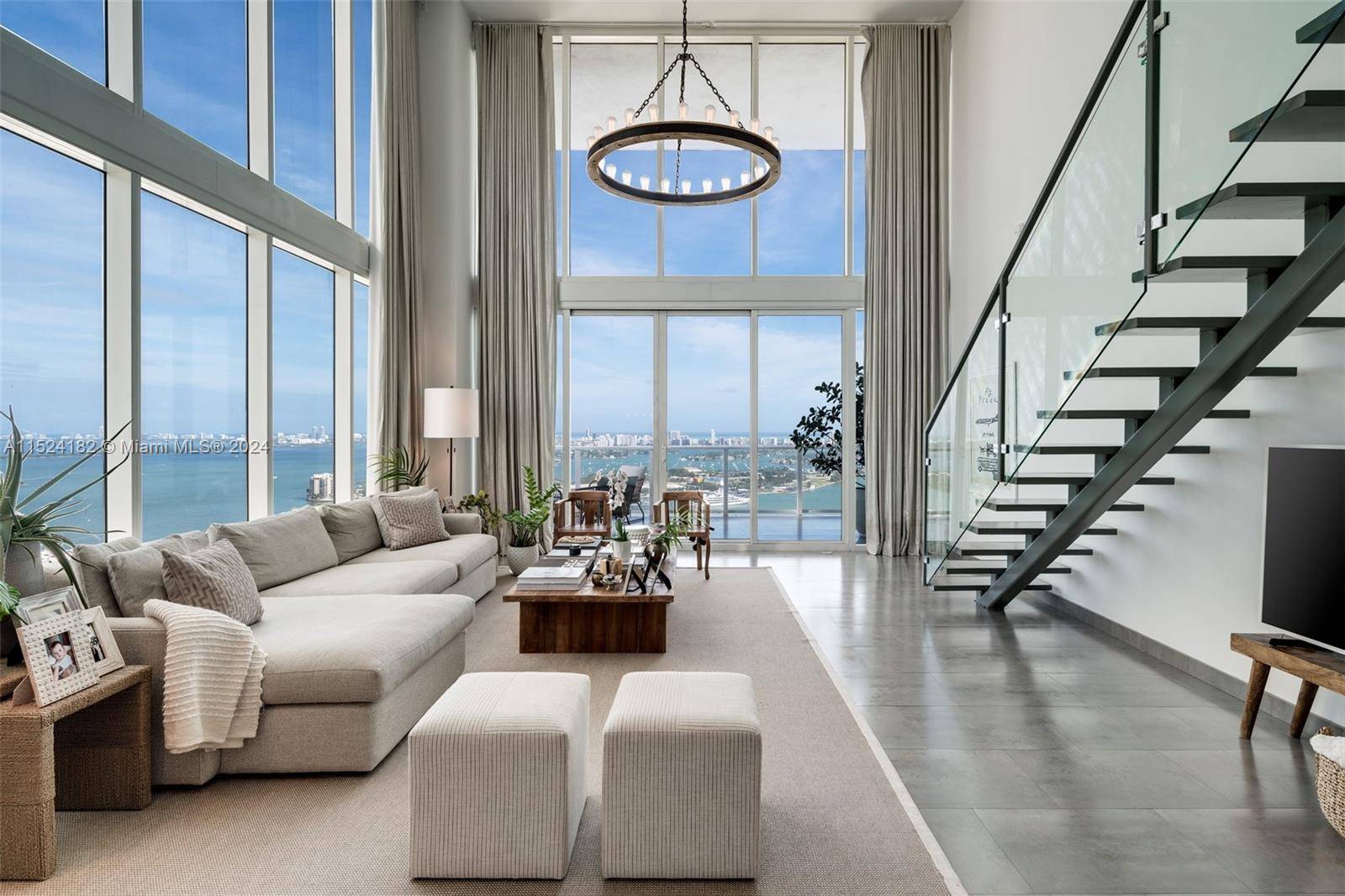 Experience luxury living at its finest in this exquisite corner unit loft at Ten Museum Miami, offering unparalleled views of the bay.