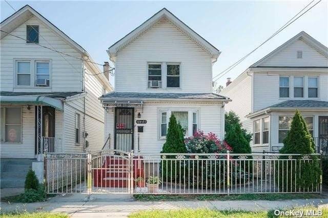 Newly renovated, bright and sunny Colonial in the heart of Queens Village !