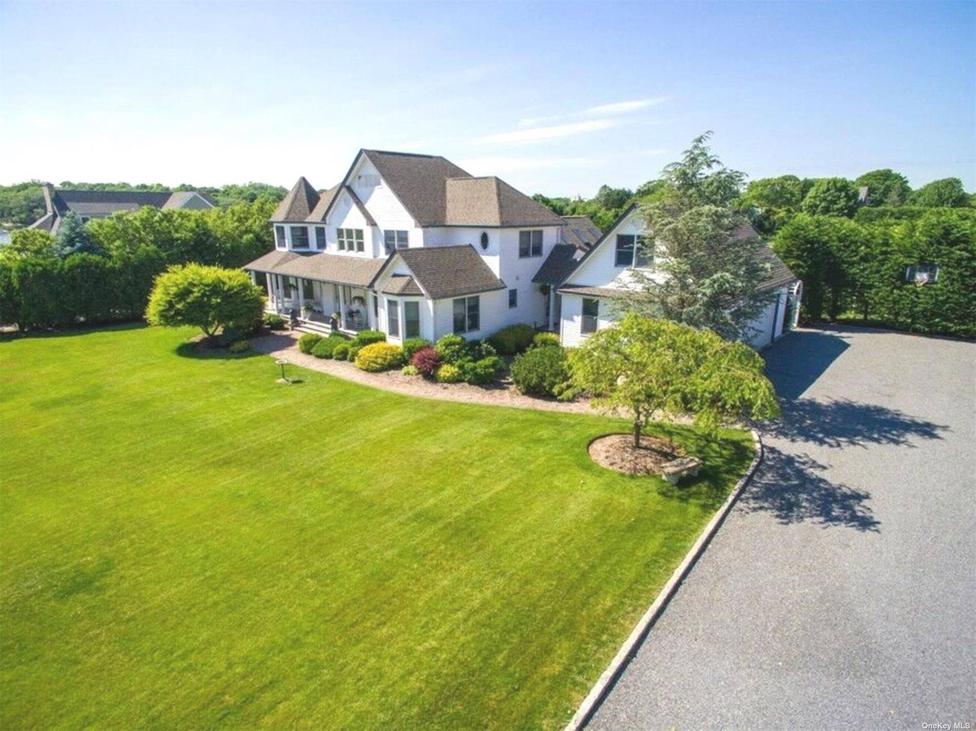 Nestled in the western edge of the Town of Southampton, on just over an acre and a half of land, sits this immaculate two story traditional.
