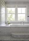 Full bath featuring a freestanding tub