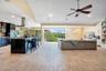 Open kitchen/living area with vaulted ceilings and an abundance of natural light