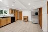 Finished Lower Level space equipped with bonus space, summer kitchen and full bathroom